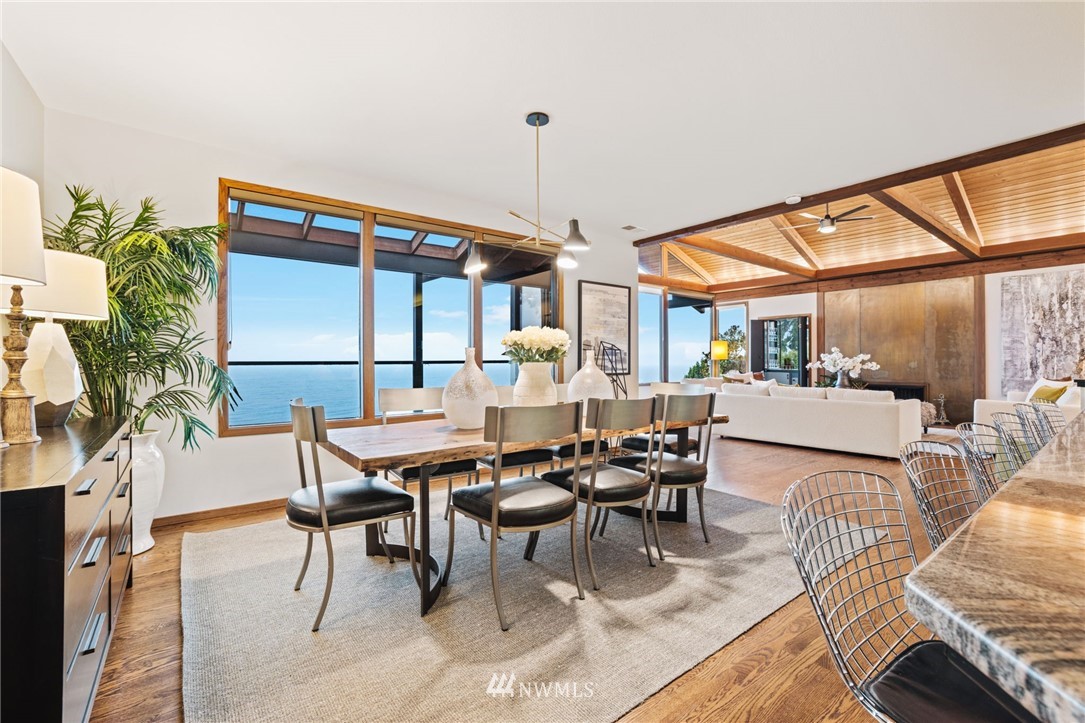 16900 Talbot Road Edmonds, WA 98026 - Photo 11 of 40 a view of a dining room with furniture window and wooden floor