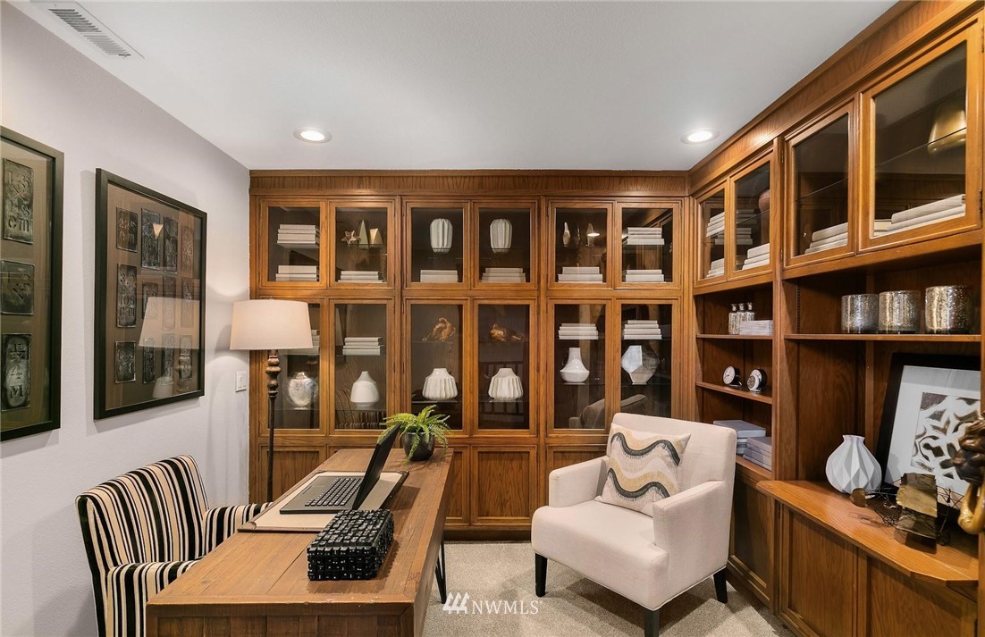 16900 Talbot Road Edmonds, WA 98026 - Photo 19 of 40 a living room with furniture fireplace and rug
