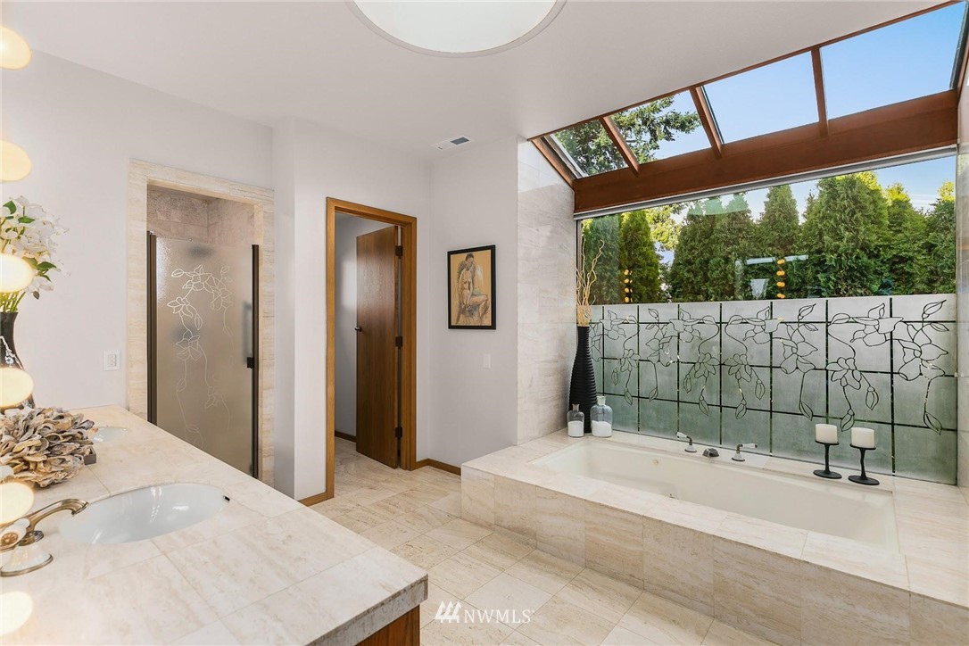 16900 Talbot Road Edmonds, WA 98026 - Photo 23 of 40 a bathroom with a bathtub and shower