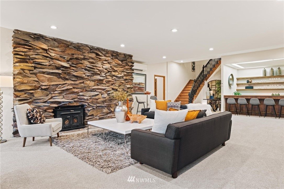 16900 Talbot Road Edmonds, WA 98026 - Photo 27 of 40 a living room with furniture and a fireplace