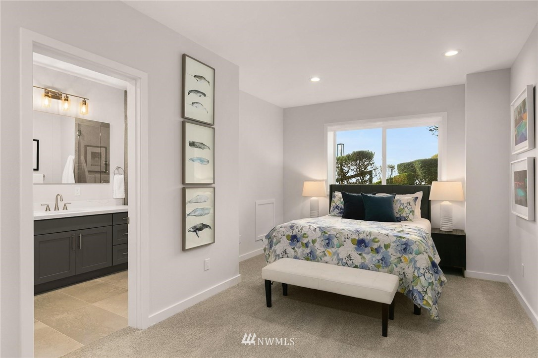 16900 Talbot Road Edmonds, WA 98026 - Photo 33 of 40 a bedroom with a bed and dresser