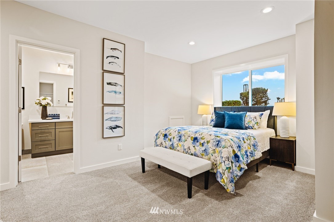 16900 Talbot Road Edmonds, WA 98026 - Photo 34 of 40 a bedroom with a bed and a cabinets