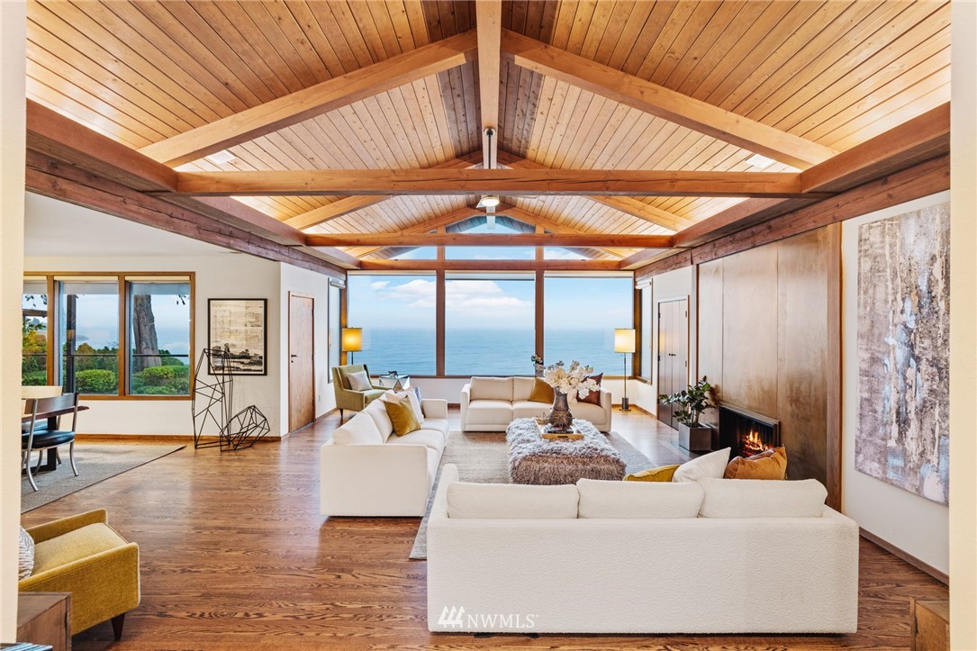 16900 Talbot Road Edmonds, WA 98026 - Photo 7 of 40 a living room with furniture and a chandelier