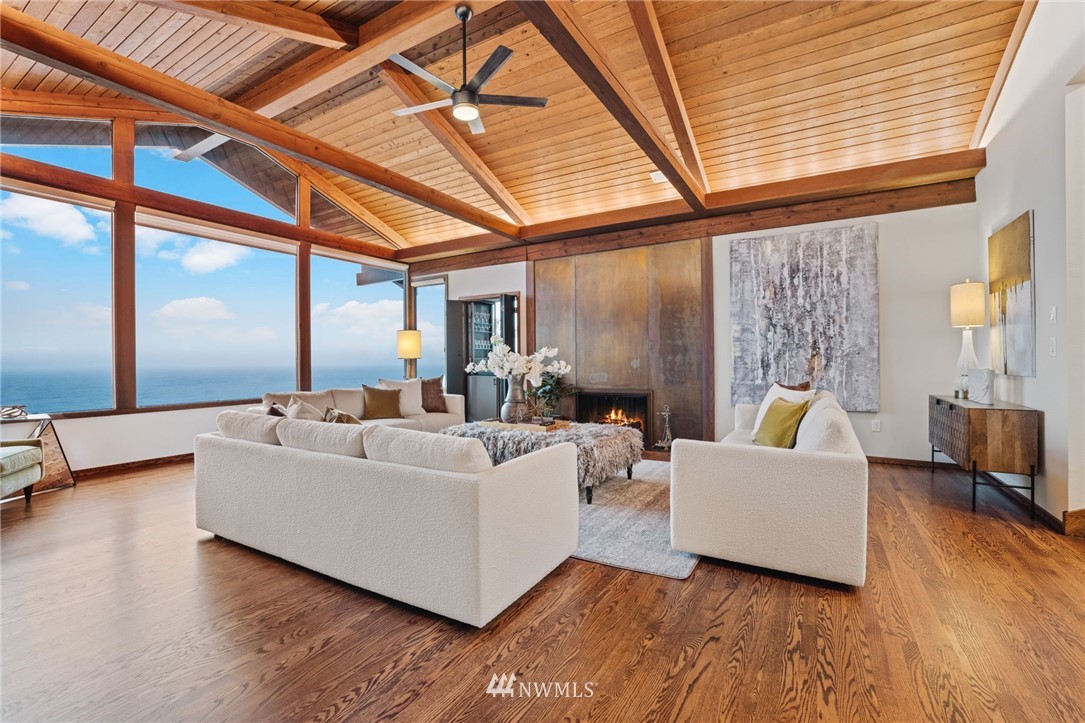 16900 Talbot Road Edmonds, WA 98026 - Photo 9 of 40 a living room with furniture and a large window