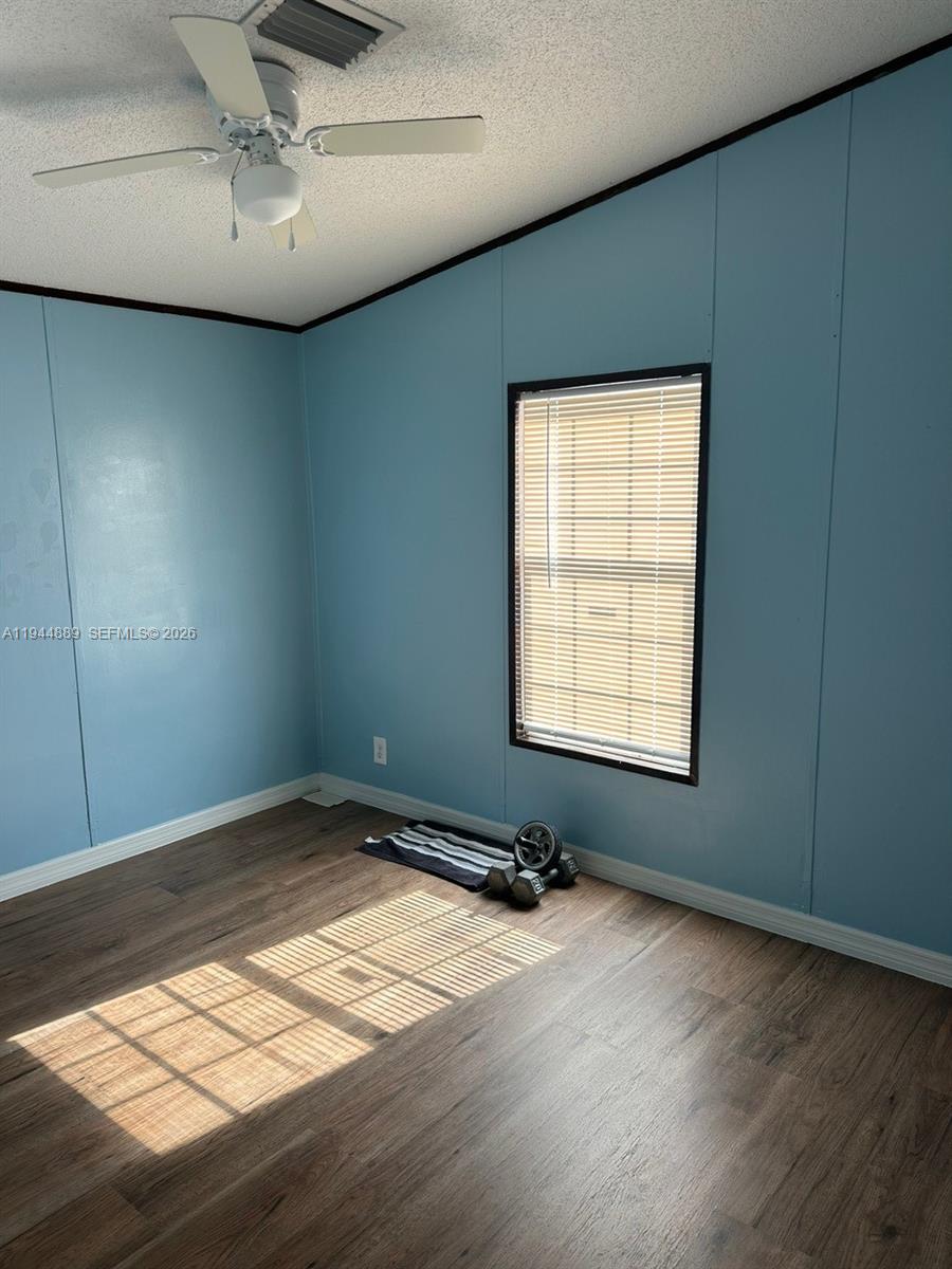 1122 Johnson Road Clewiston, FL 33440 - Photo 16 of 26 a view of a livingroom with a window