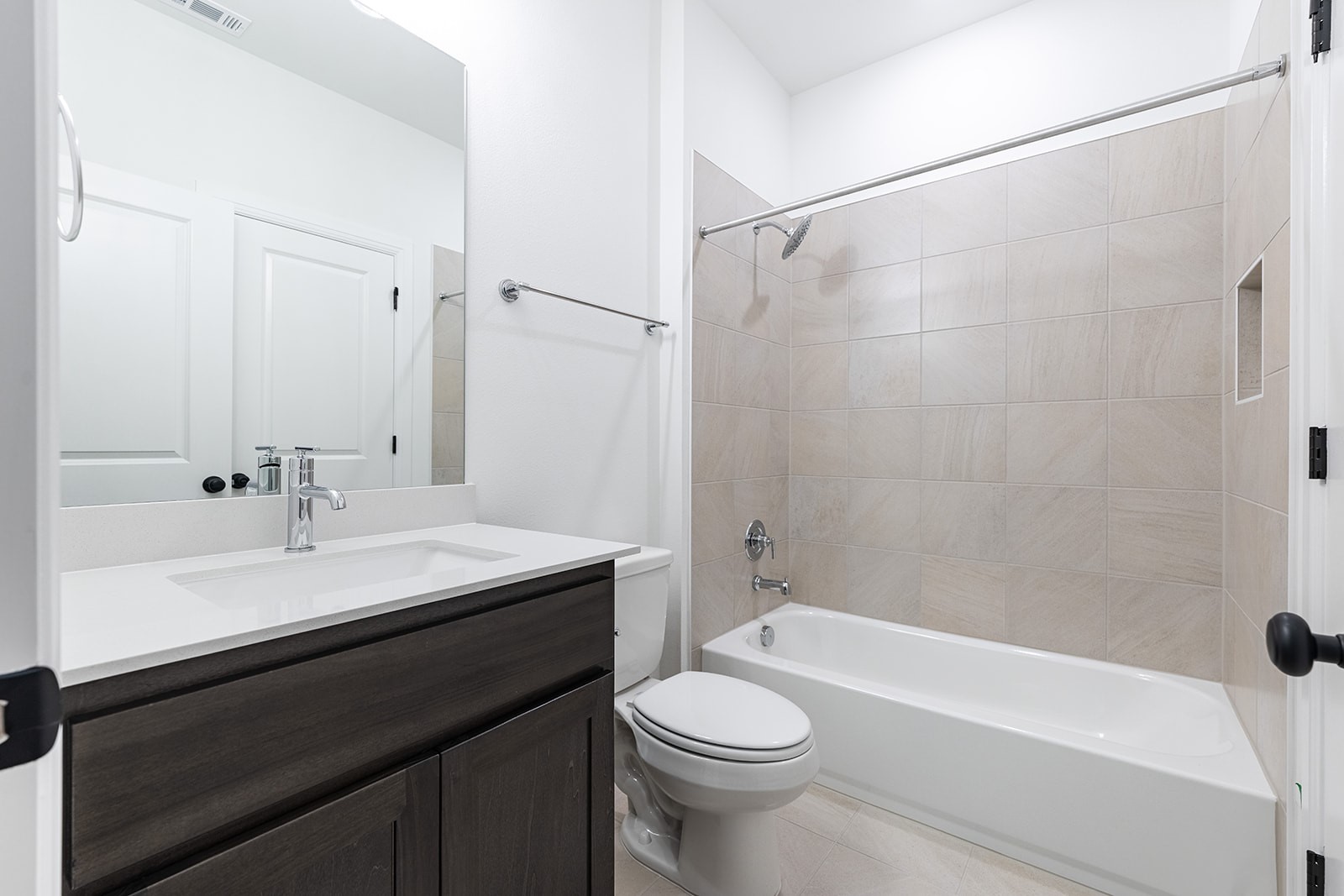 304 Barnstorm Lane Georgetown, TX 78633 - Photo 17 of 40 a bathroom with a sink a toilet and shower