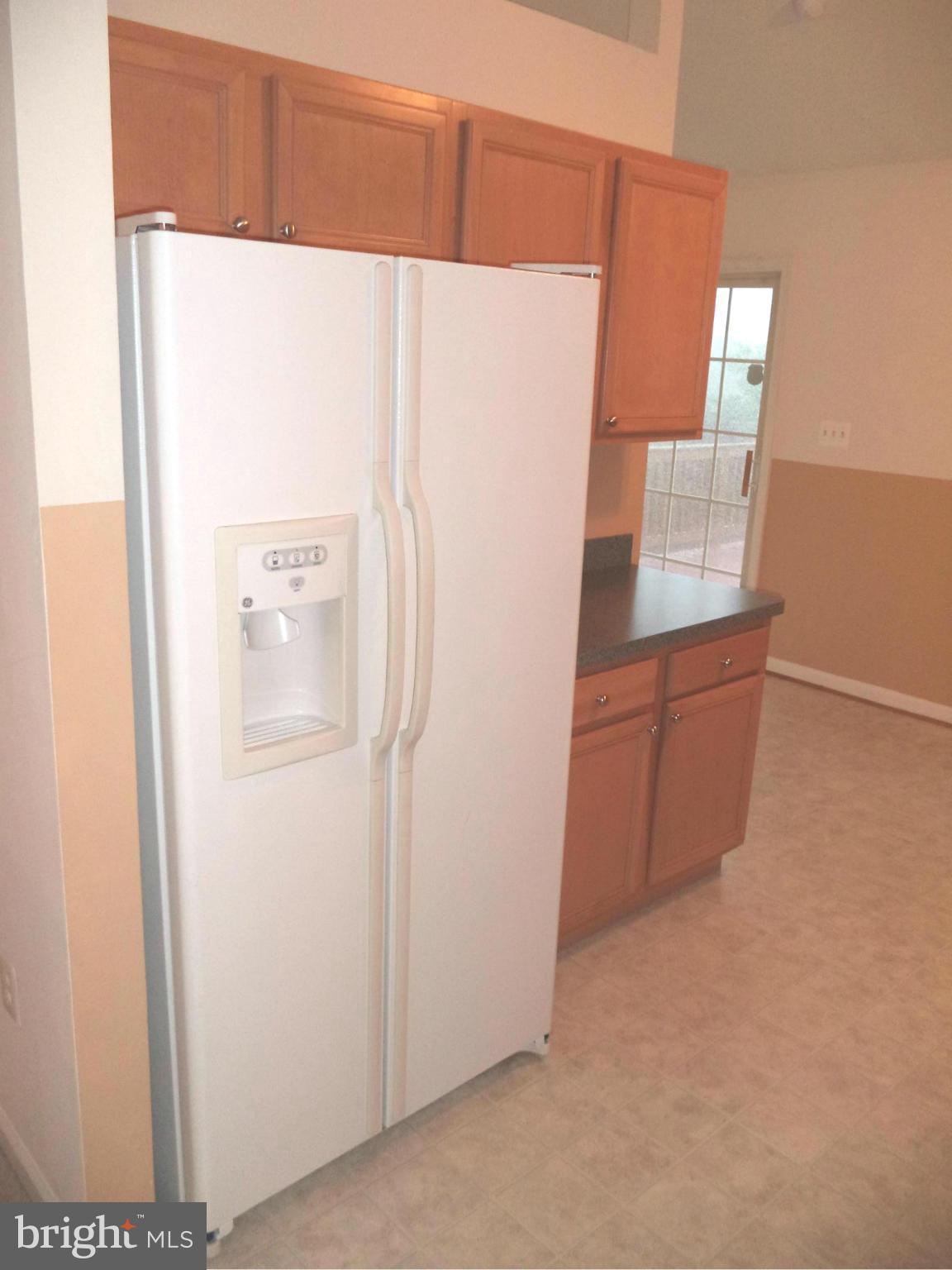 80 Ford Inwood Wv 25428 Inwood, WV 25428 - Photo 14 of 24 a white refrigerator freezer sitting in a kitchen
