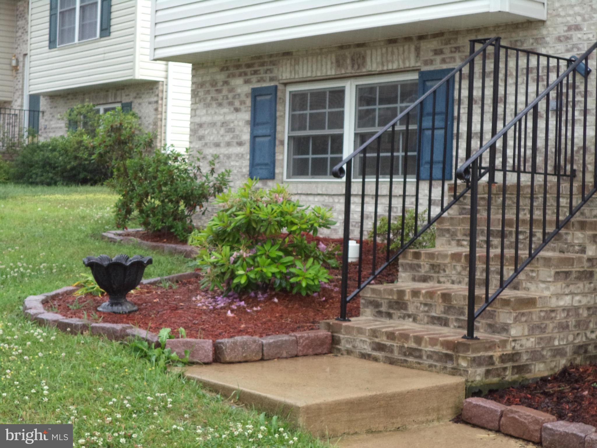 80 Ford Inwood Wv 25428 Inwood, WV 25428 - Photo 2 of 24 a view of a backyard with a garden