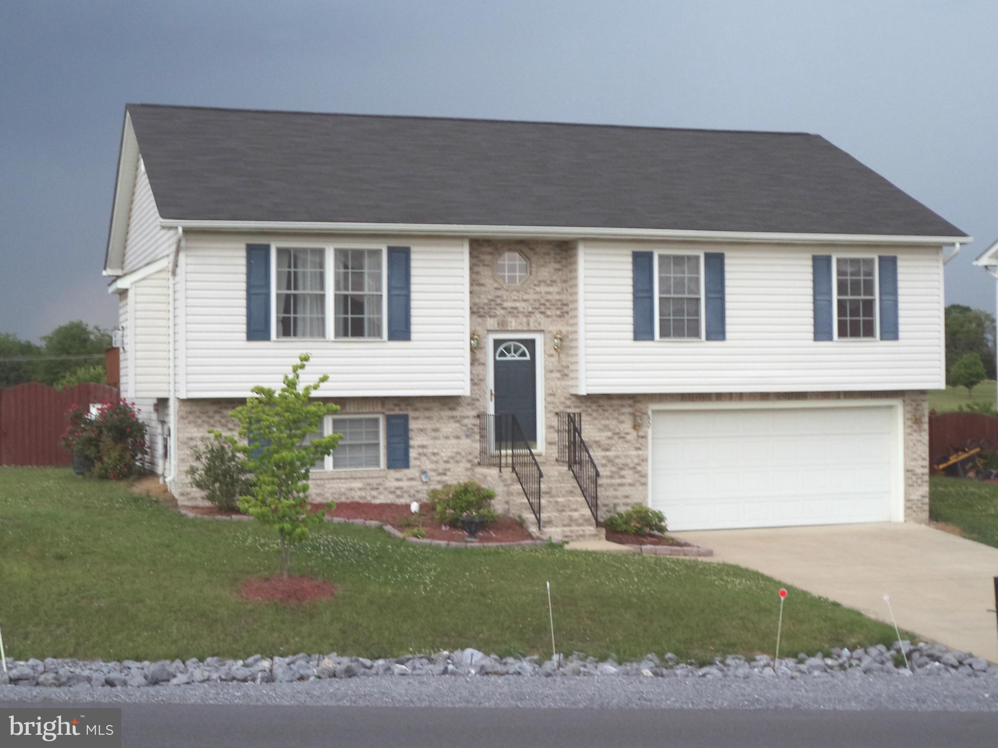 80 Ford Inwood Wv 25428 Inwood, WV 25428 - Photo 24 of 24 a front view of a house with garden