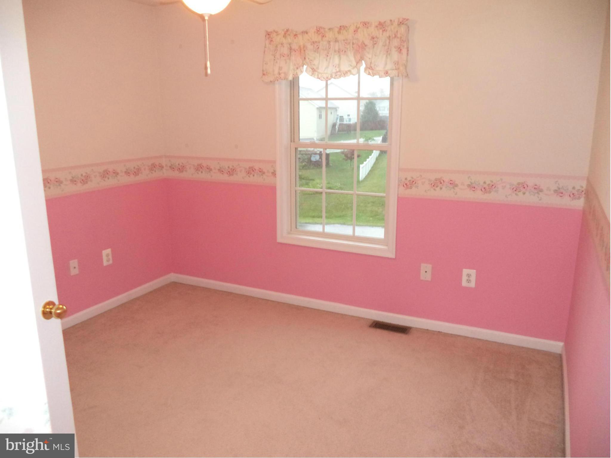 80 Ford Inwood Wv 25428 Inwood, WV 25428 - Photo 6 of 24 an empty room with windows