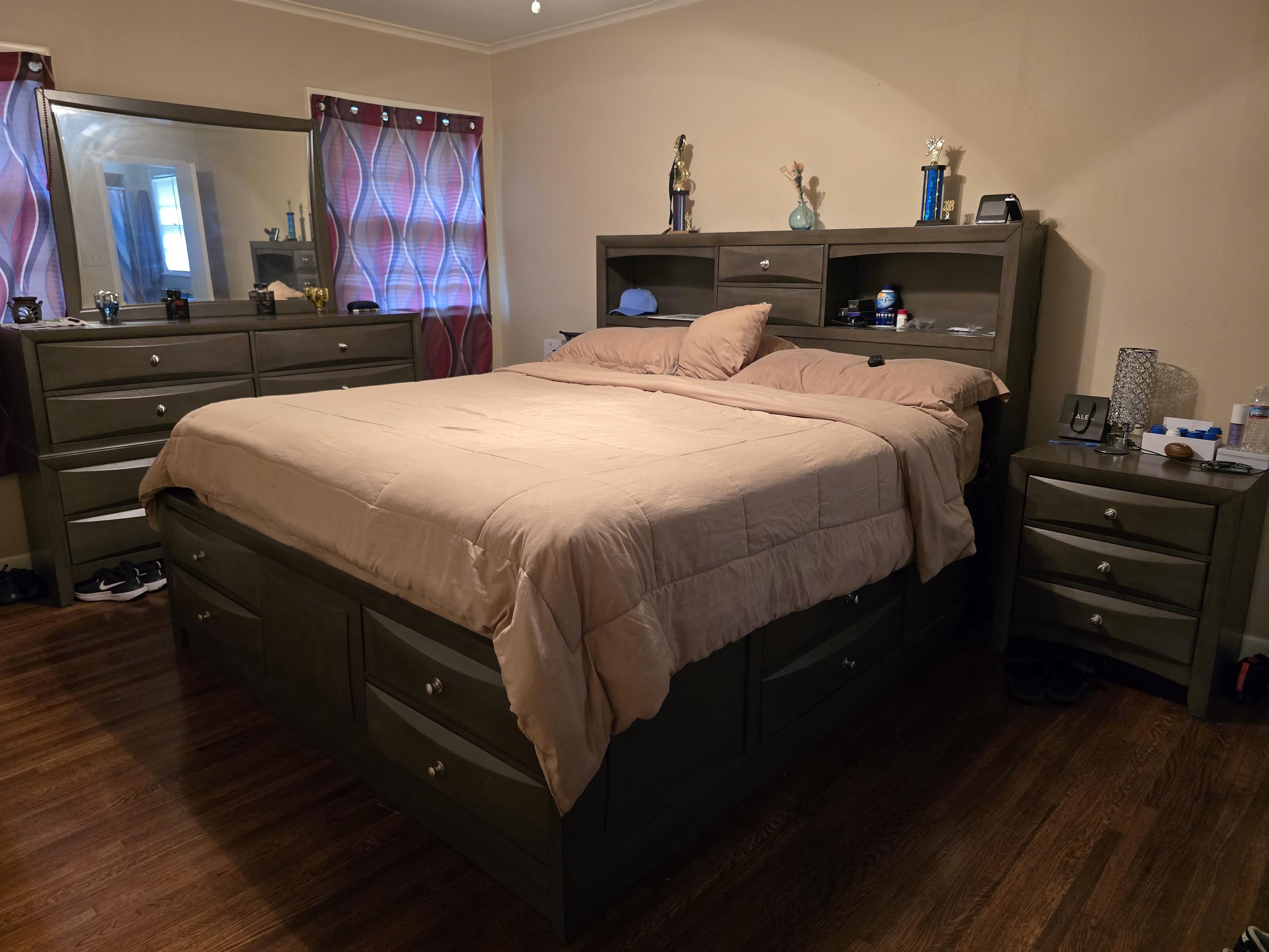 1400 Randall Drive Memphis, TN 38116 - Photo 18 of 23 a bedroom with a bed and a large mirror on dresser