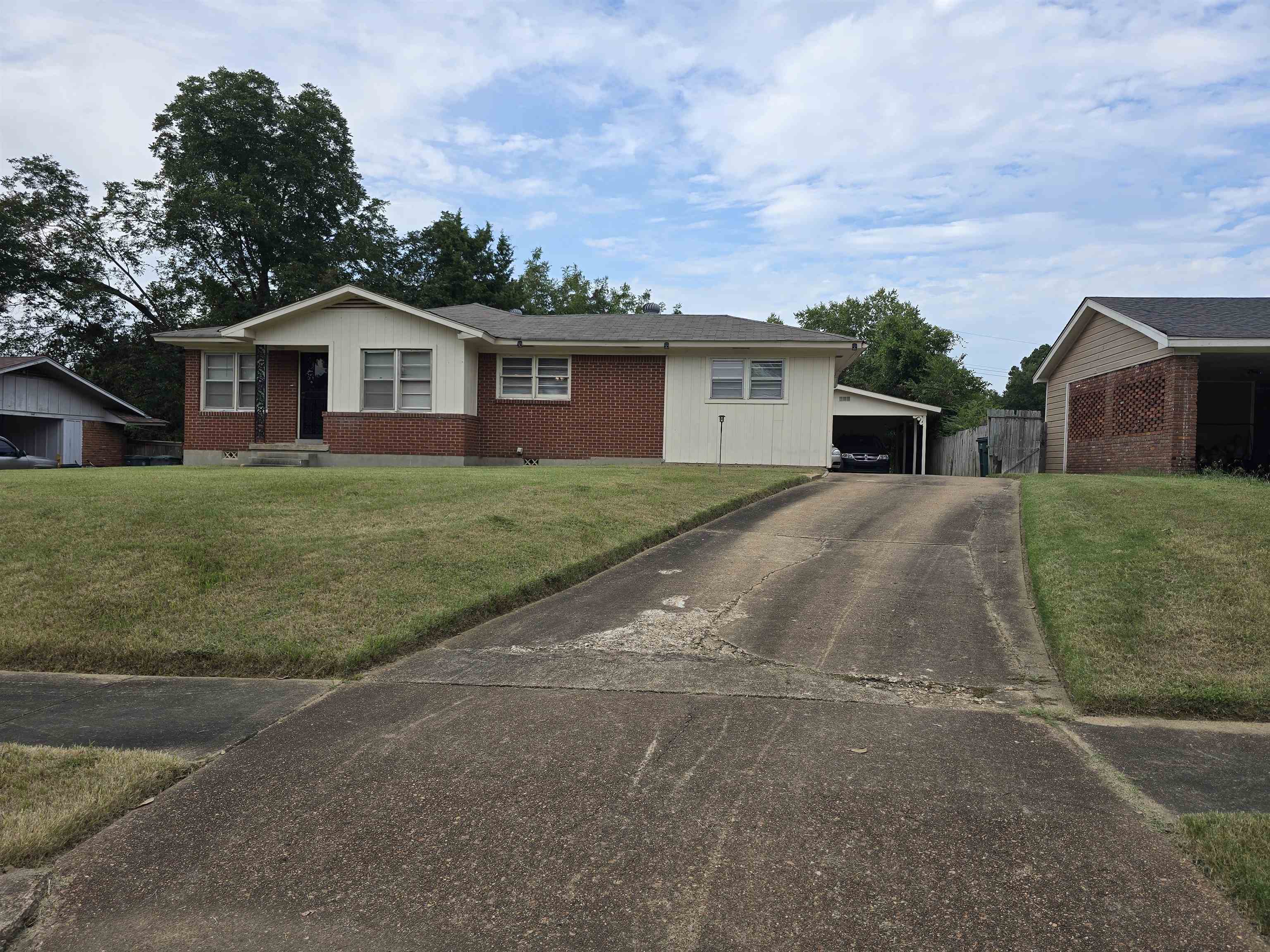 1400 Randall Drive Memphis, TN 38116 - Photo 2 of 23 a view of a house with a yard
