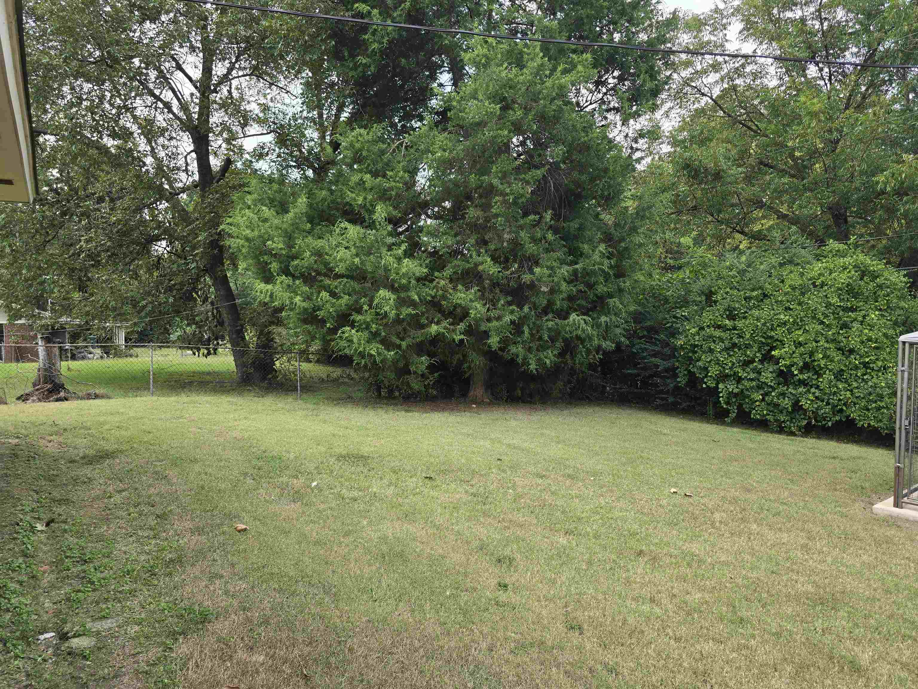 1400 Randall Drive Memphis, TN 38116 - Photo 22 of 23 a view of outdoor space with deck and yard
