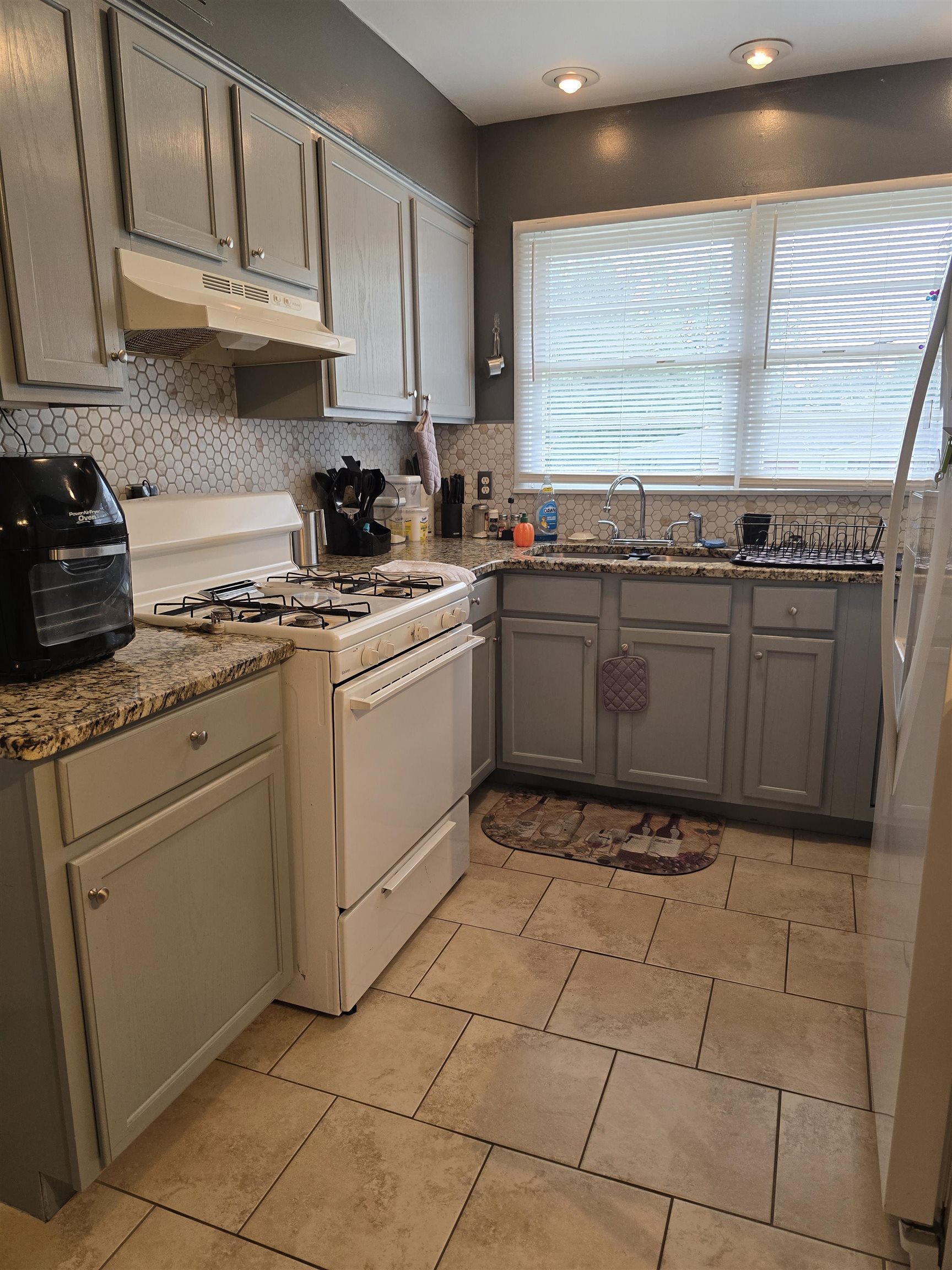 1400 Randall Drive Memphis, TN 38116 - Photo 6 of 23 a kitchen with a cabinets and appliances