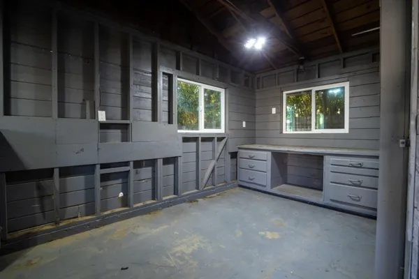 an empty room with windows