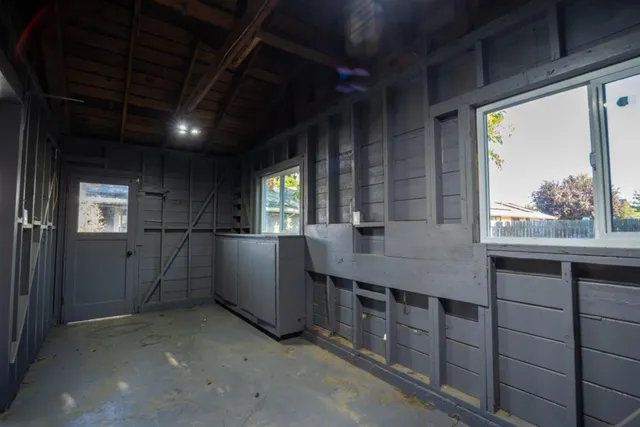 an empty room with windows