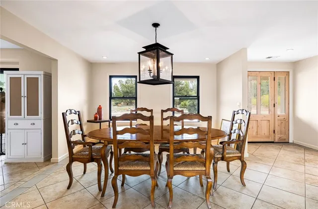a bathroom with a sink vanity mirror and toilet