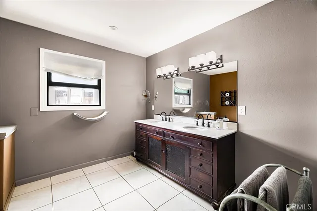 a view of house with outdoor space and sitting area