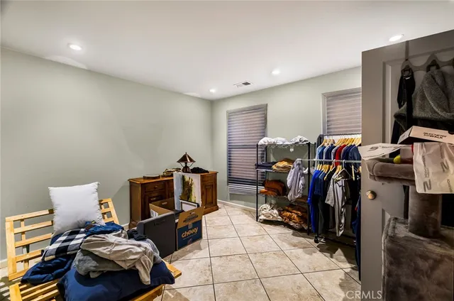 a view of a house with sitting area and roof