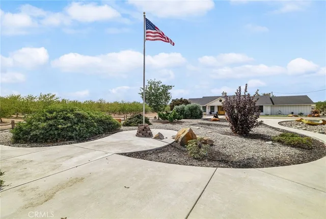 a view of a dining room with furniture and a livingroom
