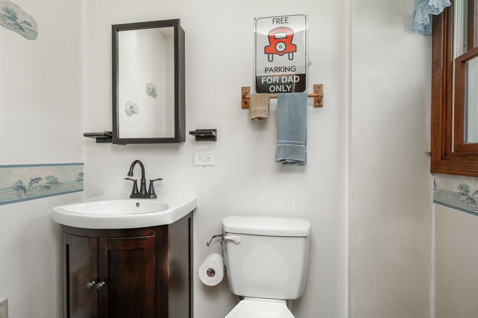 6N476 Thorn Road Hanover Park, IL 60133 - Photo 13 of 35 a bathroom with a toilet sink and mirror