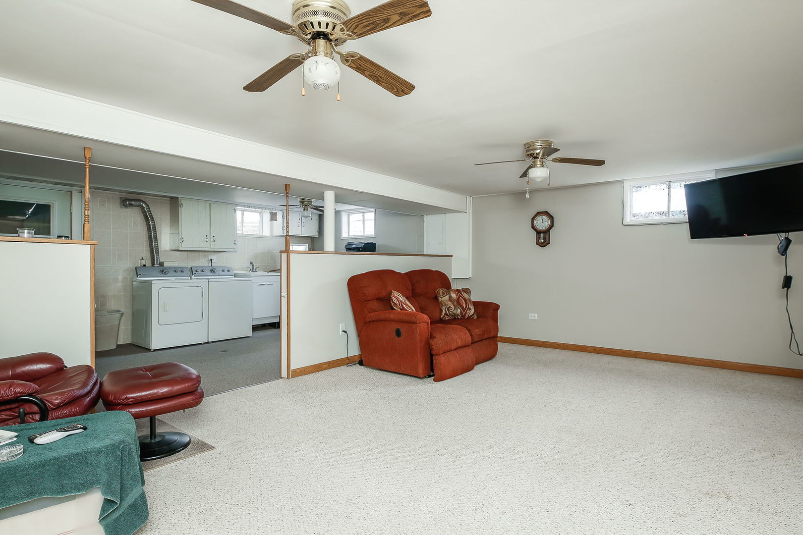6N476 Thorn Road Hanover Park, IL 60133 - Photo 18 of 35 a living room with furniture and a flat screen tv