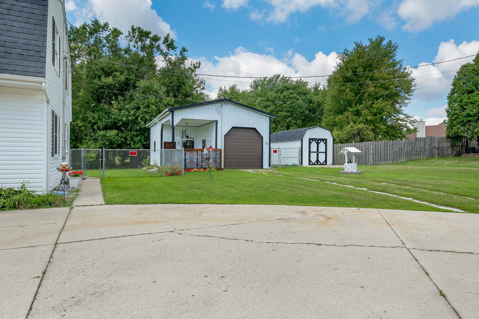 6N476 Thorn Road Hanover Park, IL 60133 - Photo 23 of 35 a view of a house with a yard and large tree