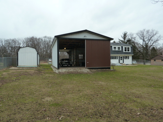 6N476 Thorn Road Hanover Park, IL 60133 - Photo 28 of 35 a front view of a house with garden