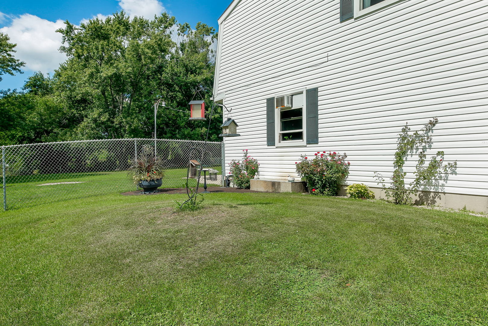6N476 Thorn Road Hanover Park, IL 60133 - Photo 31 of 35 a view of backyard with house and garden