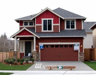 19528 Bartlett Road Bothell, WA 98012 - Photo 1 of 1 a front view of a house with a garden