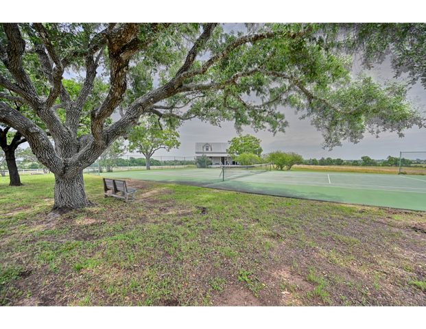 a view of outdoor space with deck and yard