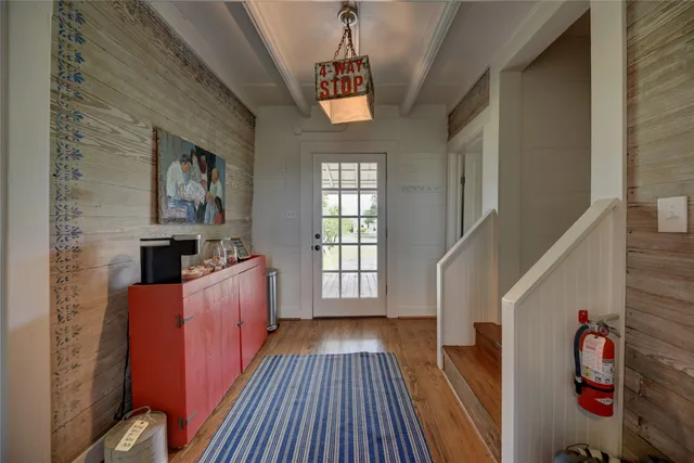 a bedroom with furniture or couch and a window