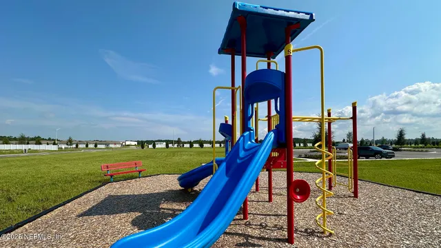 a view of a park with iron stairs