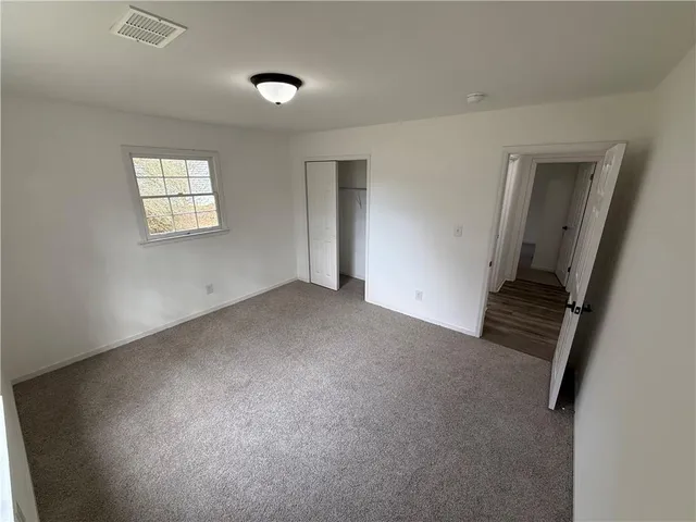 an empty room with windows