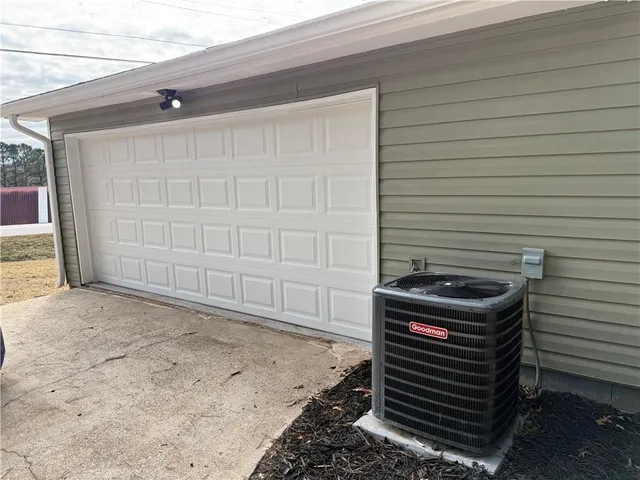 a view of an empty room and a window