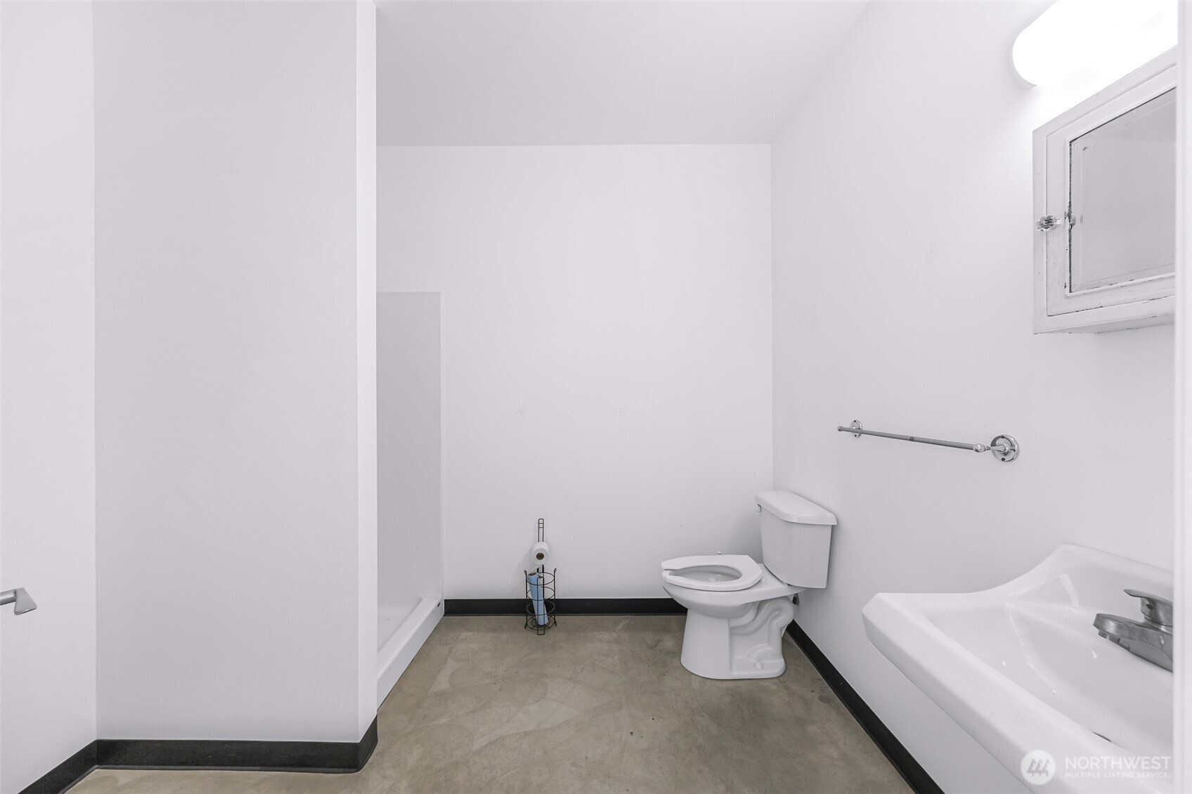 1957 Baltic Way, Unit 111 Ferndale, WA 98248 - Photo 15 of 27 a bathroom with a toilet and a sink