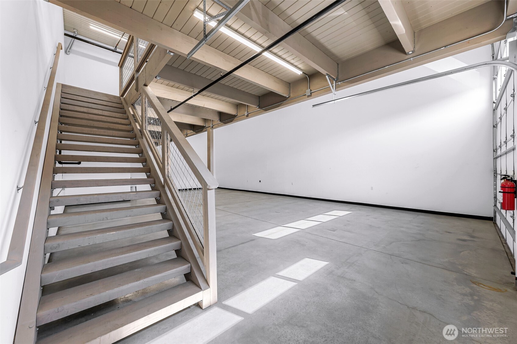 1957 Baltic Way, Unit 111 Ferndale, WA 98248 - Photo 17 of 27 a view of an empty room with stairs