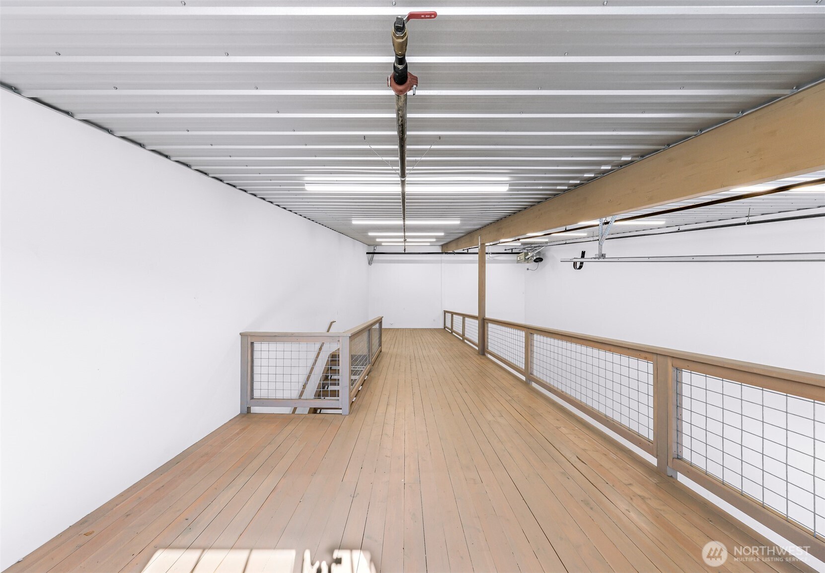1957 Baltic Way, Unit 111 Ferndale, WA 98248 - Photo 26 of 27 a view of a room with wooden floor