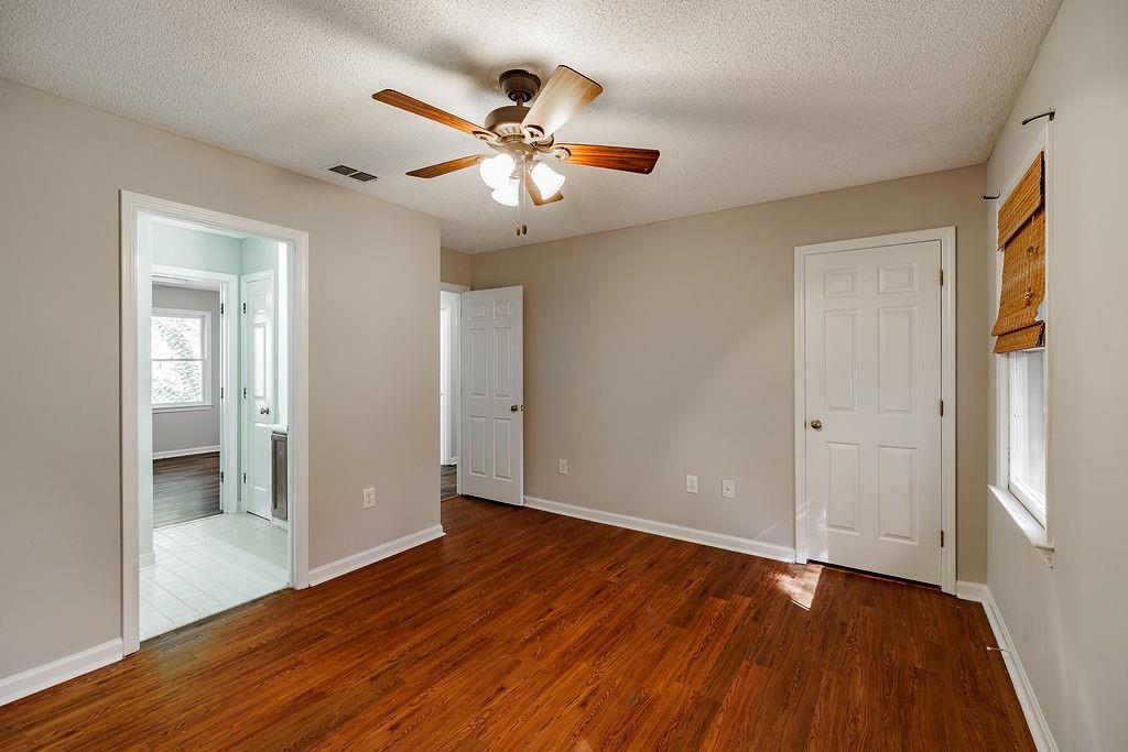 345 Research Drive, Unit 330 Athens, GA 30605 - Photo 11 of 31 a view of an empty room with wooden floor and a window