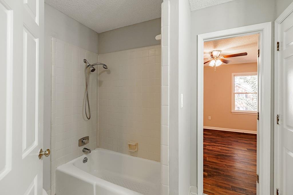 345 Research Drive, Unit 330 Athens, GA 30605 - Photo 13 of 31 a bathroom with a bathtub