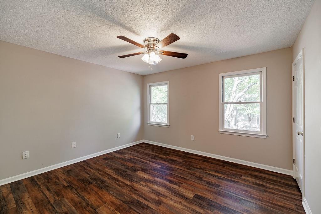 345 Research Drive, Unit 330 Athens, GA 30605 - Photo 20 of 31 a view of an empty room with window and wooden floor