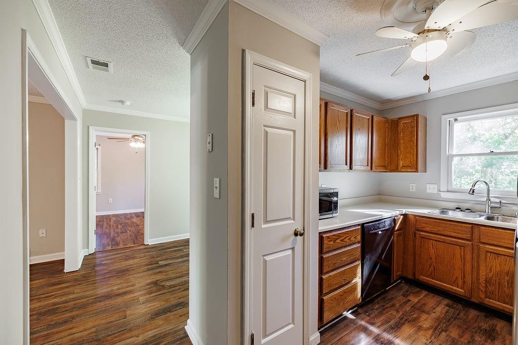 345 Research Drive, Unit 330 Athens, GA 30605 - Photo 2 of 31 a view of a kitchen cabinets a sink and wooden floor