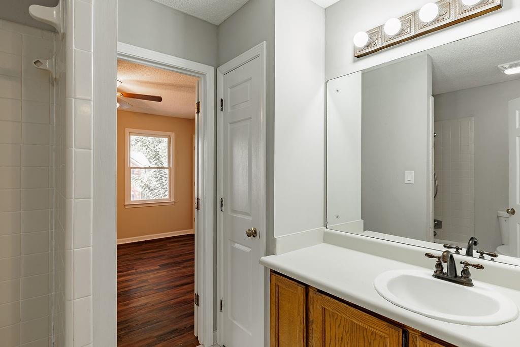 345 Research Drive, Unit 330 Athens, GA 30605 - Photo 21 of 31 a bathroom with a sink and a mirror