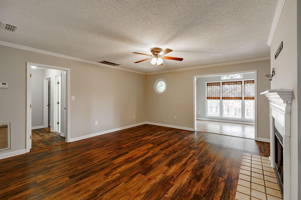 345 Research Drive, Unit 330 Athens, GA 30605 - Photo 5 of 31 a view of empty room with wooden floor and fan