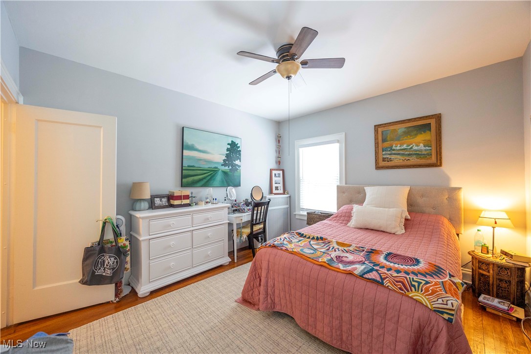 2075 Coventry Road Cleveland, OH 44118 - Photo 14 of 41 Bedroom with ceiling fan and light hardwood / wood-style floors