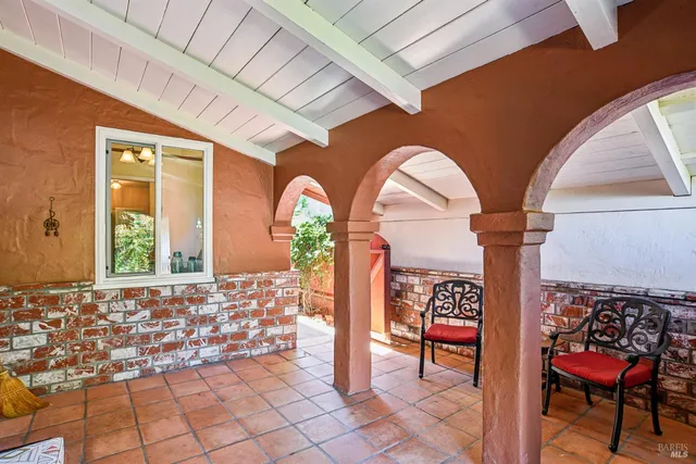 a view of an entryway door front of a house