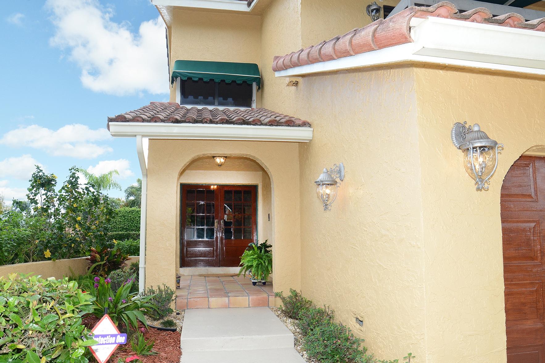 2898 Northwest 26th Court Boca Raton, FL 33434 - Photo 3 of 27 Covered Entry