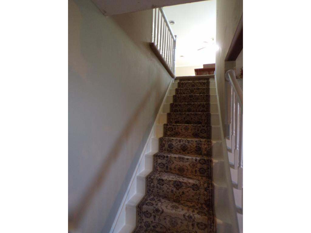727 Hospital Road Mountain City, TN 37683 - Photo 28 of 36 STAIRWAY TO FULL BASEMENT