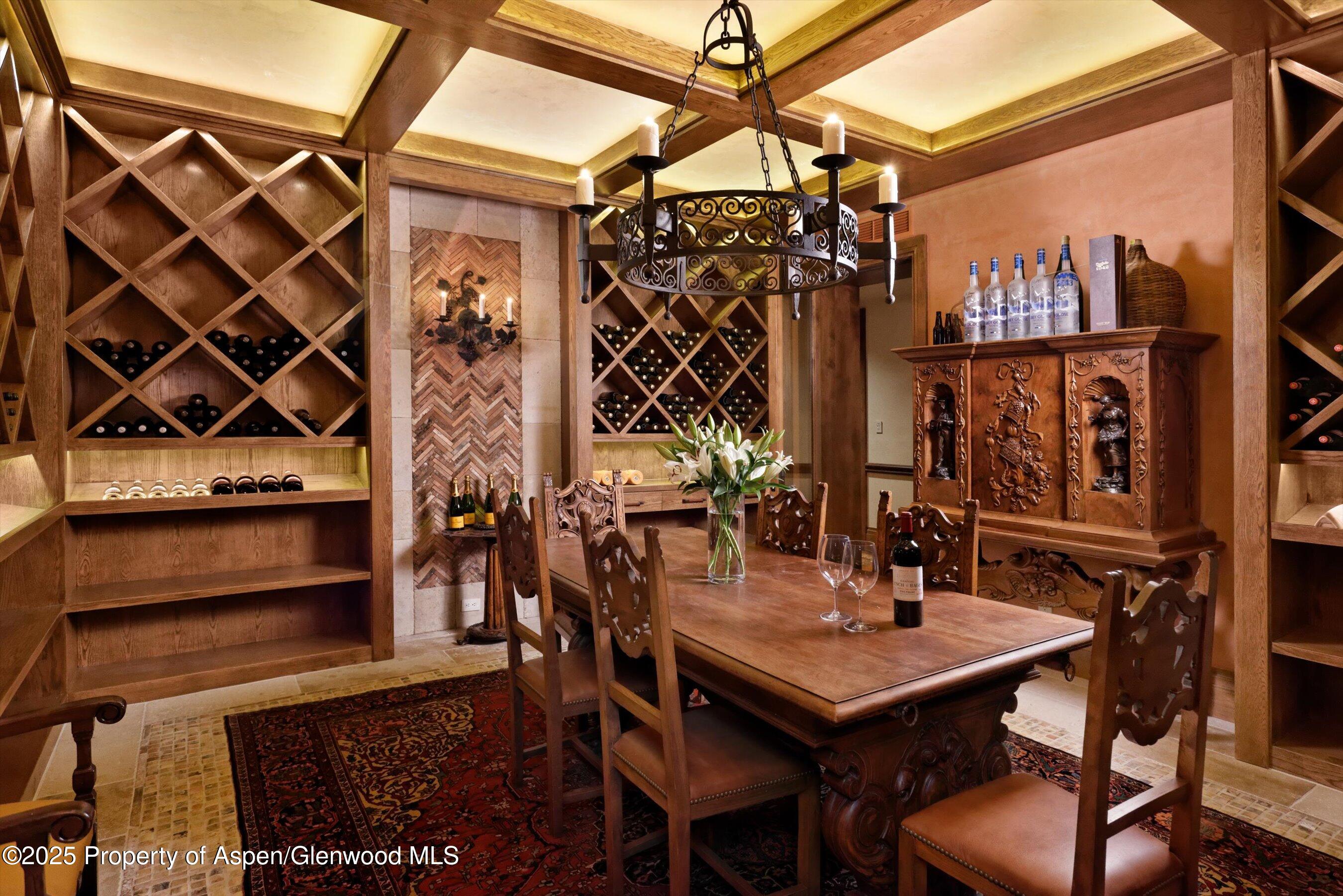 220 Buttermilk Lane Aspen, CO 81611 - Photo 15 of 60 a view of a chairs and table in a patio