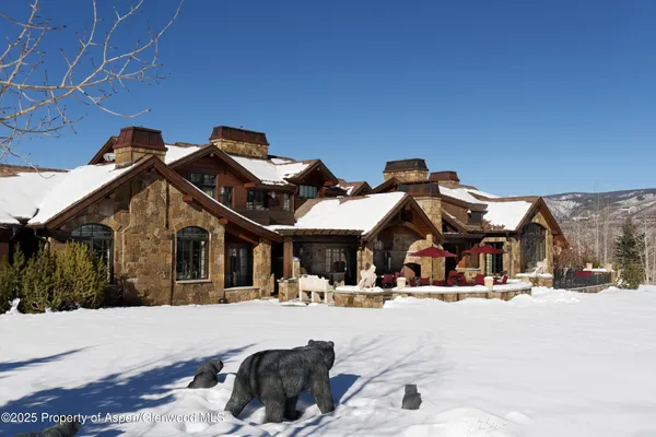 a view of outdoor space yard and blue kitchen